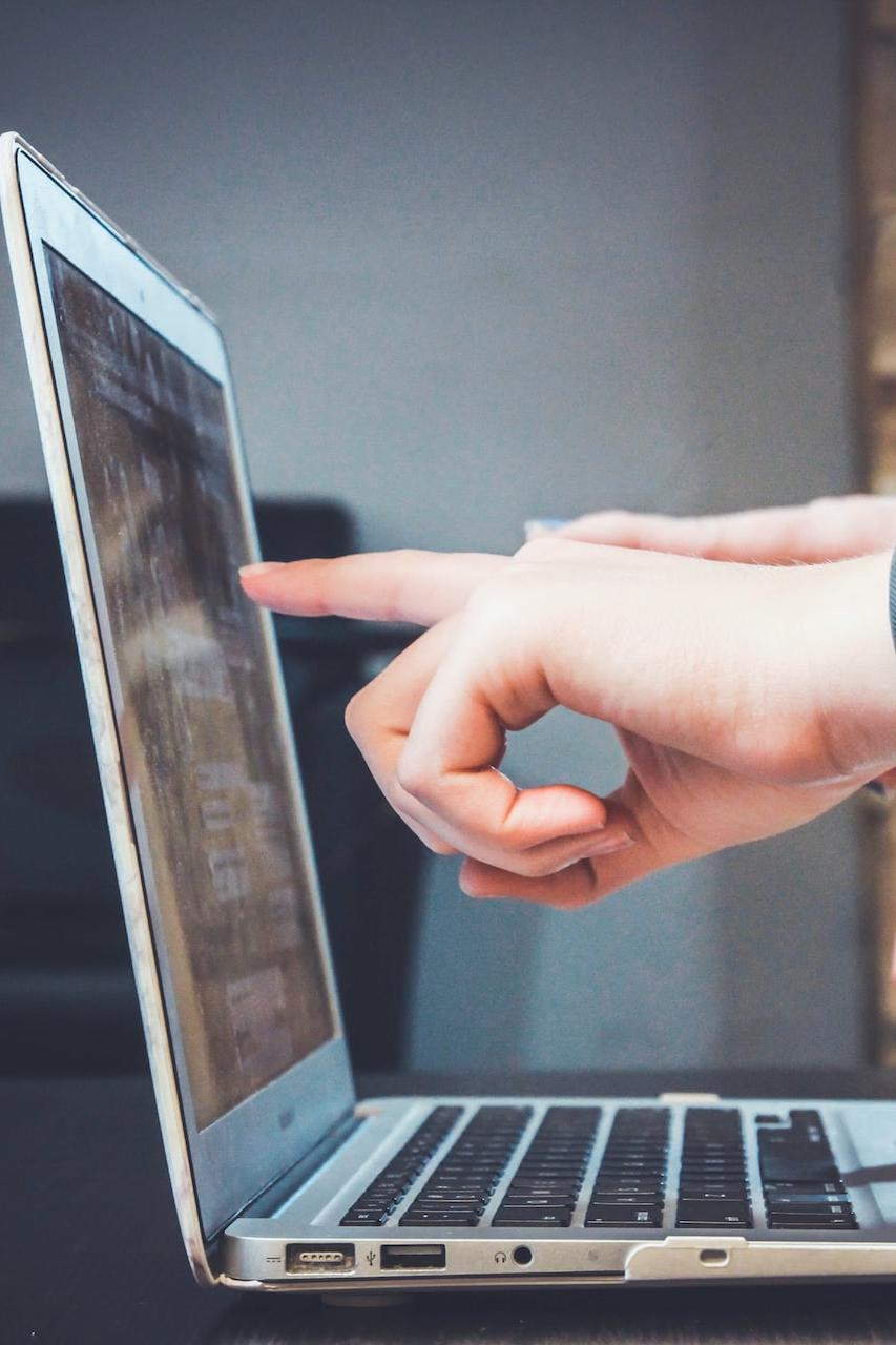 person using laptop
